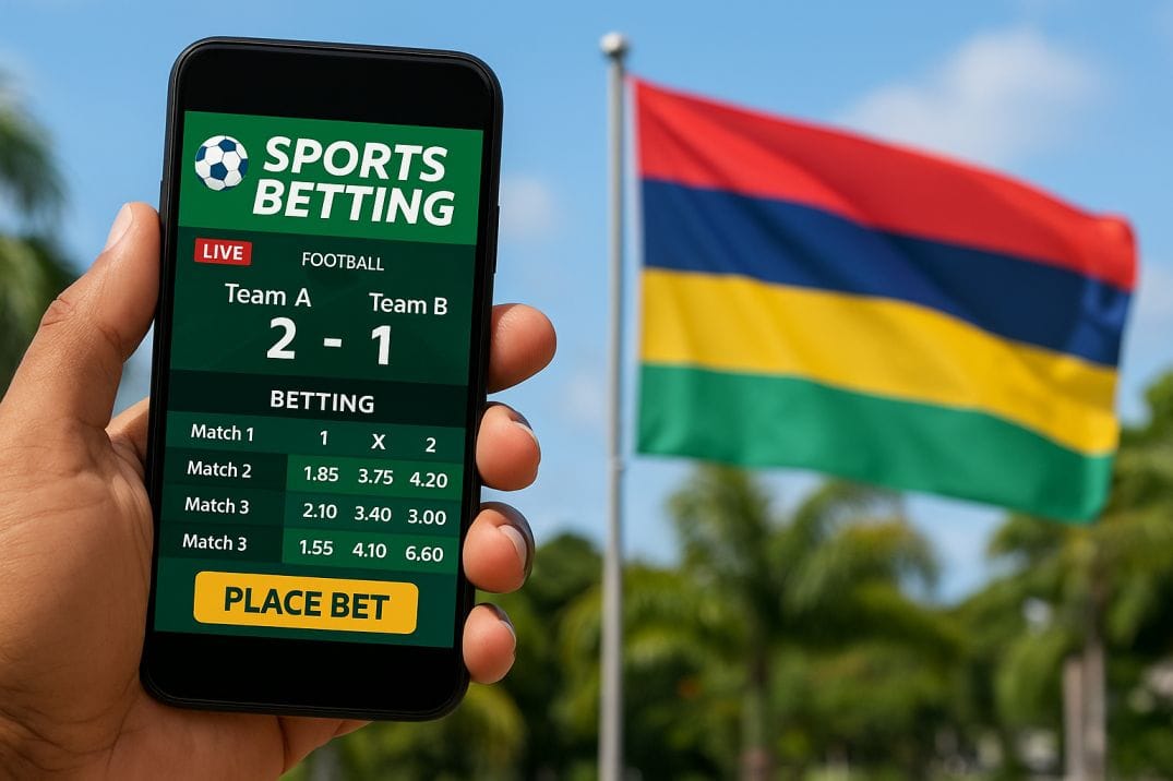 A person using a mobile sports betting app in front of the Mauritius flag, representing sports betting in Mauritius.